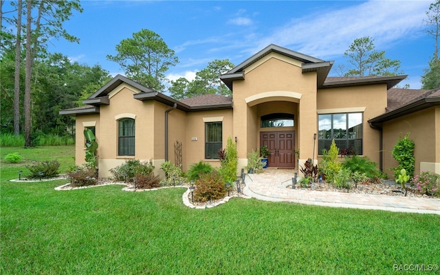 view of front of house with a front lawn