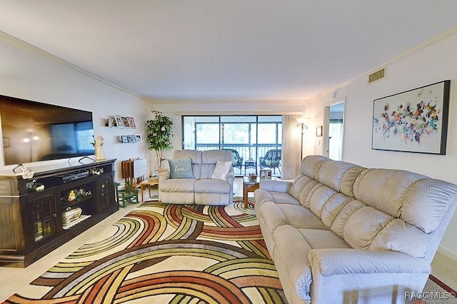 living room featuring crown molding and light tile patterned flooring