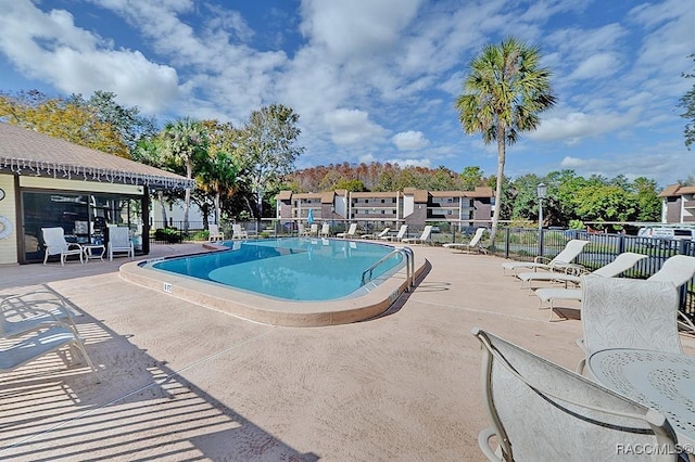 view of pool featuring a patio