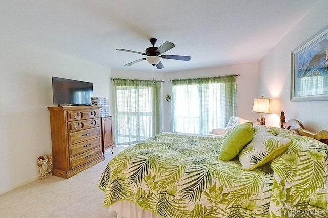 bedroom with light tile patterned floors and ceiling fan