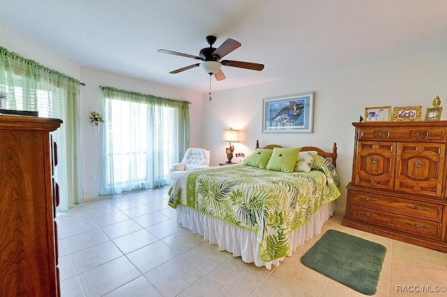 bedroom with light tile patterned floors and ceiling fan