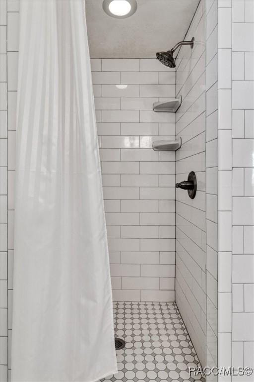 bathroom with walk in shower