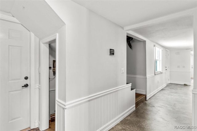 corridor with concrete floors