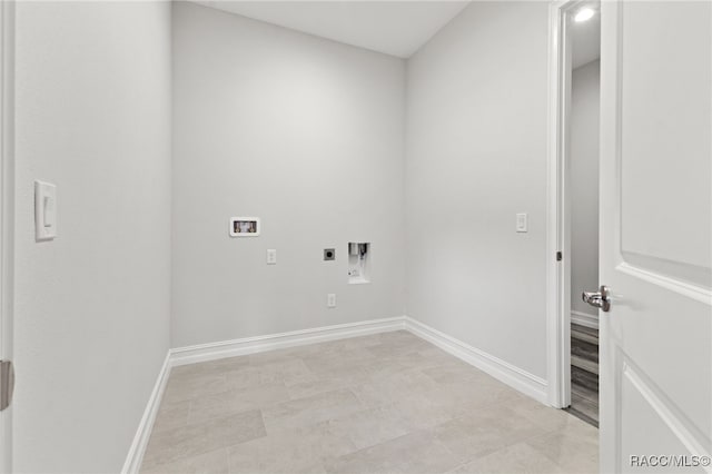 washroom with electric dryer hookup, light tile patterned floors, and hookup for a washing machine