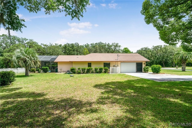 262 N Indianapolis Ave, Hernando, FL 34442 - ranch-style home featuring an attached garage, driveway, stucco siding, and view of scattered trees