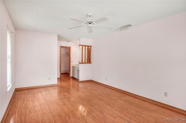 262 N Indianapolis Ave, Hernando, FL 34442 - unfurnished room with light wood finished floors, ceiling fan, and baseboards