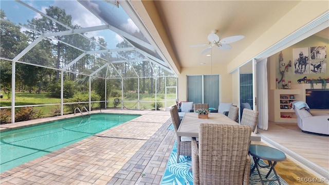 4690 W Tomahawk Dr, Beverly Hills, FL 34465 - swimming pool featuring a patio, a ceiling fan, and glass enclosure