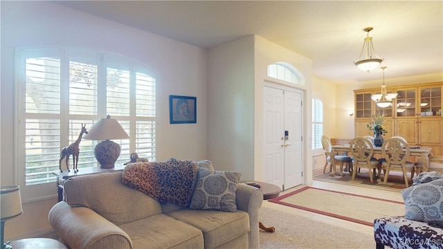 4690 W Tomahawk Dr, Beverly Hills, FL 34465 - living room featuring a chandelier and wood finished floors