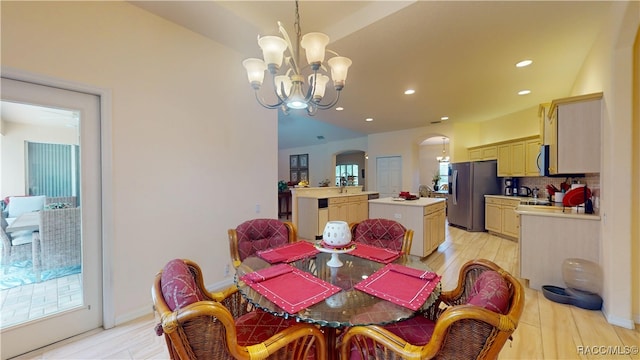 4690 W Tomahawk Dr, Beverly Hills, FL 34465 - dining room featuring arched walkways, a chandelier, light wood-style flooring, and recessed lighting