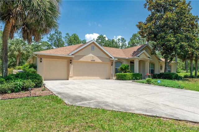 4690 W Tomahawk Dr, Beverly Hills, FL 34465 - single story home featuring stucco siding, an attached garage, concrete driveway, and a front yard