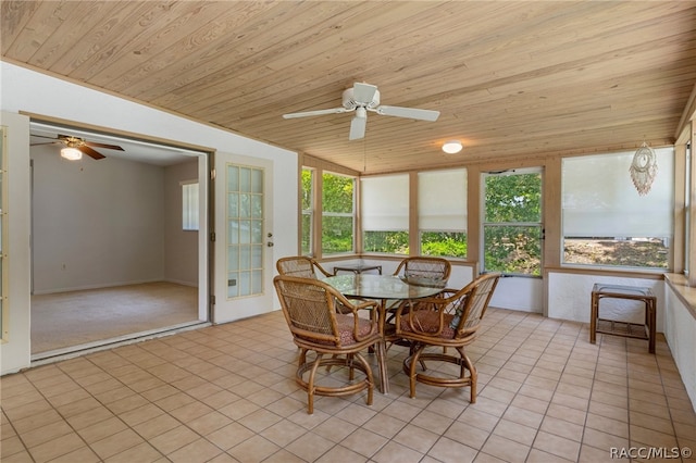 unfurnished sunroom featuring ceiling fan and wooden ceiling