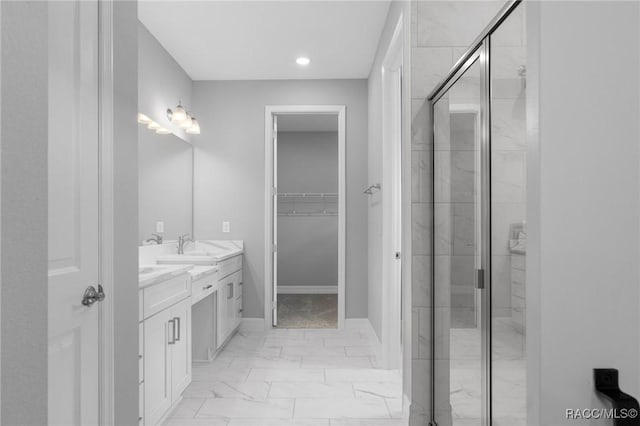 43 Bells Of Ireland Ct, Homosassa, FL 34446 - bathroom featuring marble look tiles, vanity, a stall shower, a spacious closet, and recessed lighting
