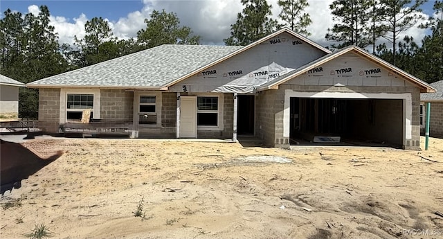 763 W Hallam Dr, Citrus Springs, FL 34434 - property in mid-construction with an attached garage and a shingled roof