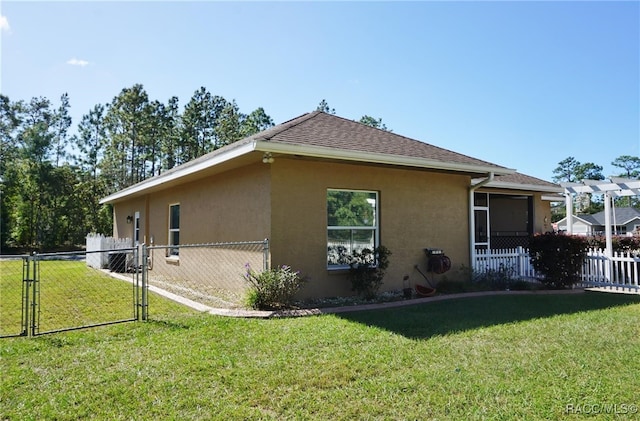 view of home's exterior featuring a yard