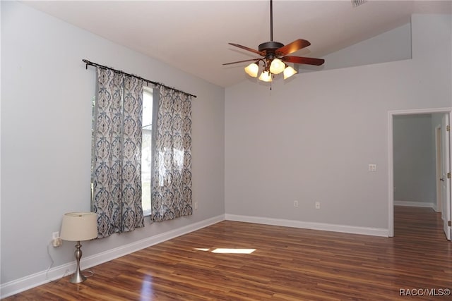 unfurnished room with ceiling fan, dark hardwood / wood-style flooring, and lofted ceiling