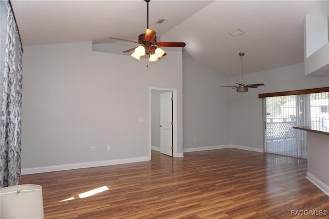 unfurnished living room with dark hardwood / wood-style floors, high vaulted ceiling, and ceiling fan