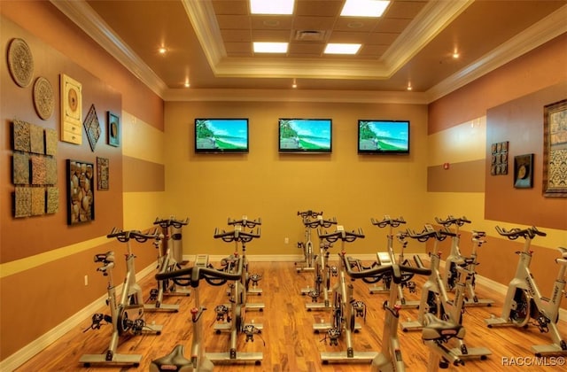 270 E Keller Ct, Hernando, FL 34442 - workout area with wood finished floors, a tray ceiling, baseboards, and crown molding