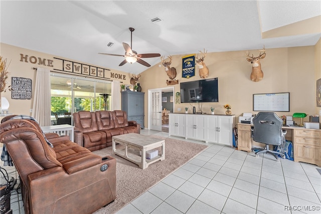 tiled living room featuring lofted ceiling