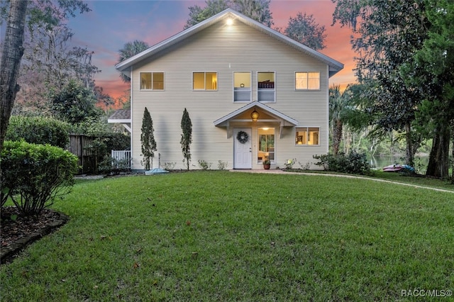 view of front property with a lawn