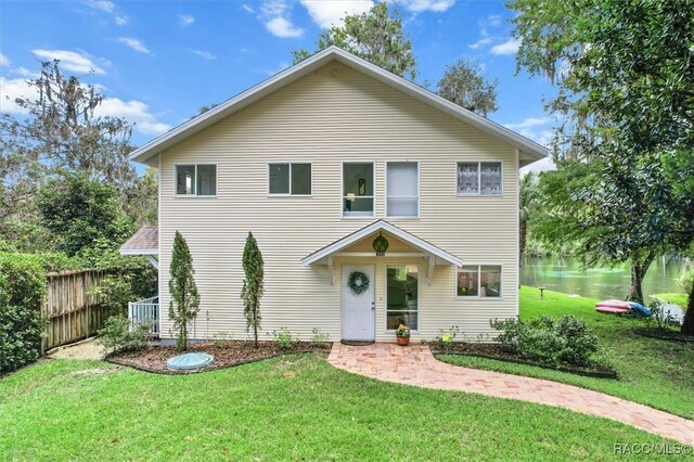 front facade with a front lawn