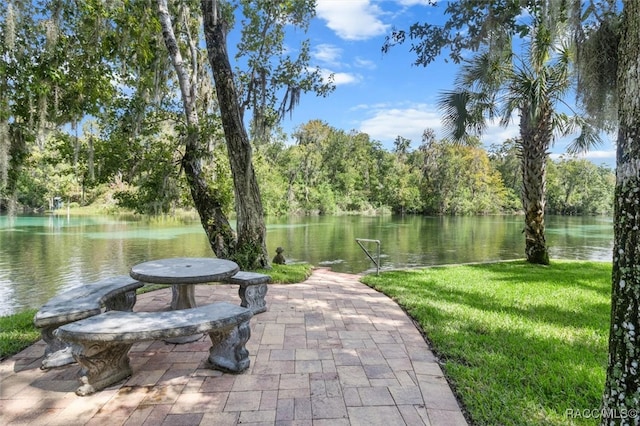 view of patio / terrace with a water view