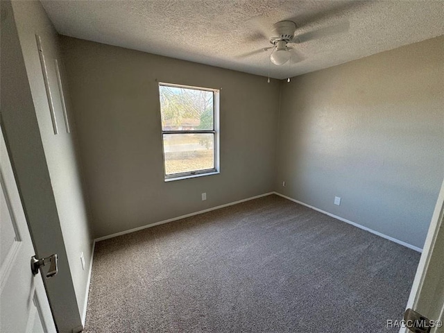 unfurnished room featuring carpet floors, a textured ceiling, and ceiling fan