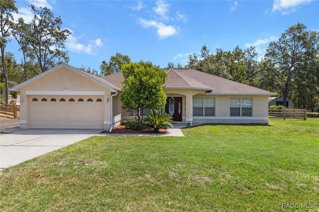 single story home with fence, an attached garage, stucco siding, and concrete driveway