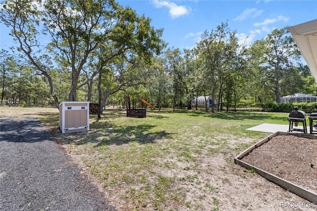 view of yard with a playground