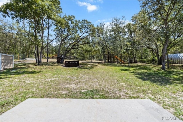 view of yard featuring a playground