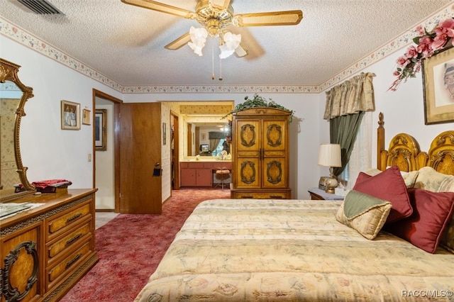 carpeted bedroom featuring a textured ceiling and ceiling fan