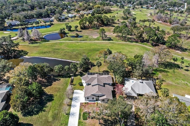 bird's eye view featuring a water view and golf course view