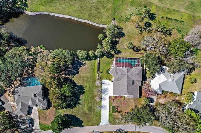 birds eye view of property featuring a water view