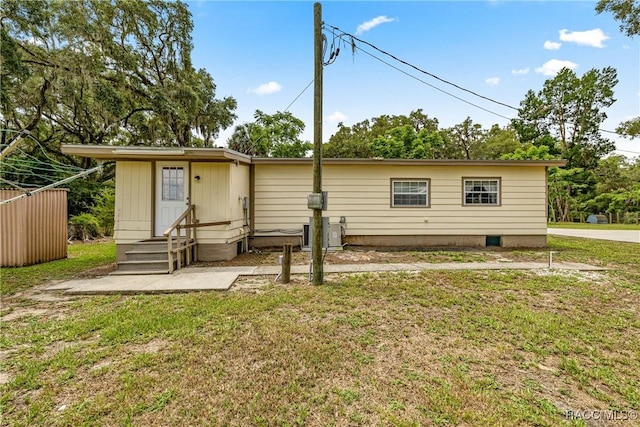 22535 SW 117th St, Dunnellon, FL 34431 - rear view of house with a yard