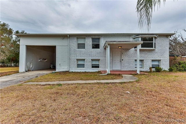 bi-level home with a front yard