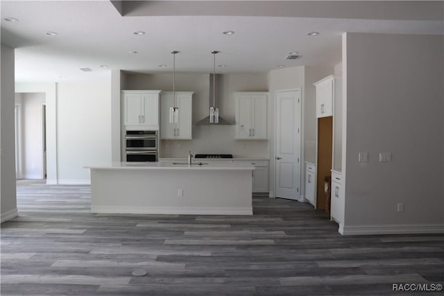6392 Summit View Dr, Brooksville, FL 34604 - kitchen with wall chimney exhaust hood, a sink, white cabinetry, and dark wood-type flooring
