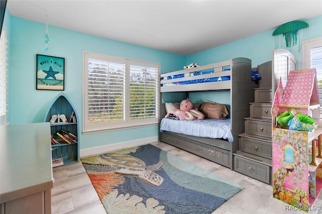 bedroom with multiple windows