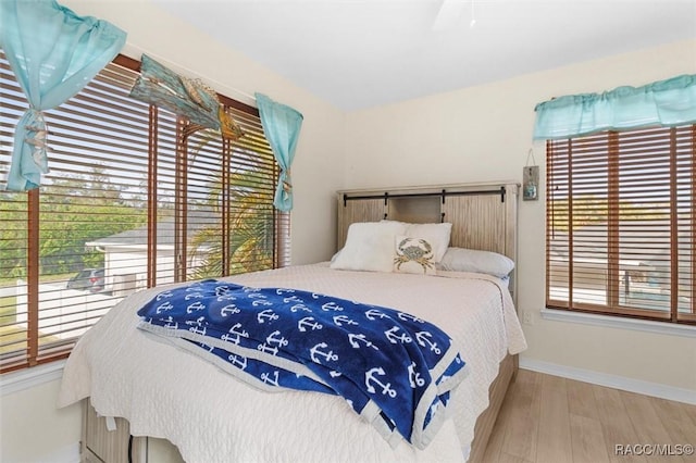 bedroom featuring light hardwood / wood-style flooring