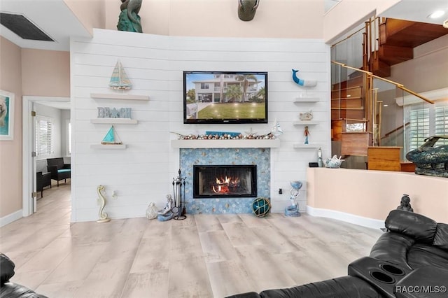 living room with wood-type flooring and a wealth of natural light