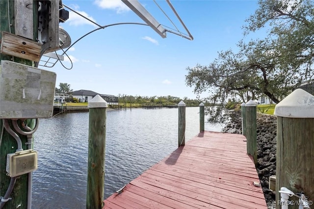 view of dock with a water view