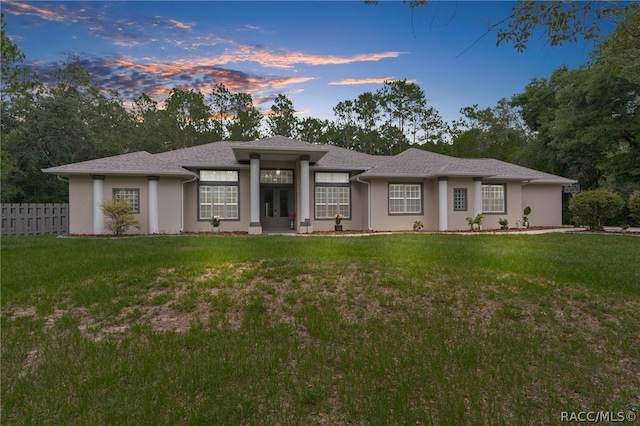 prairie-style house with a lawn