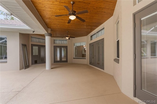 view of patio / terrace featuring french doors and ceiling fan