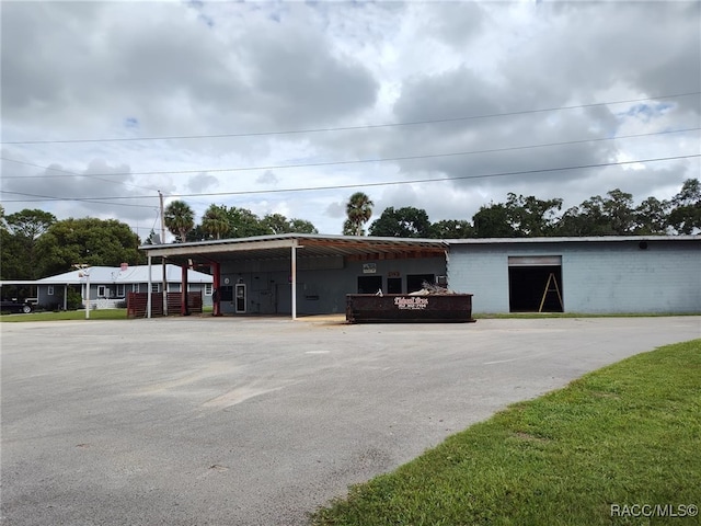 exterior space featuring a carport