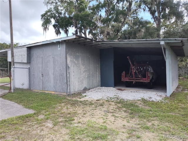 exterior space featuring a carport