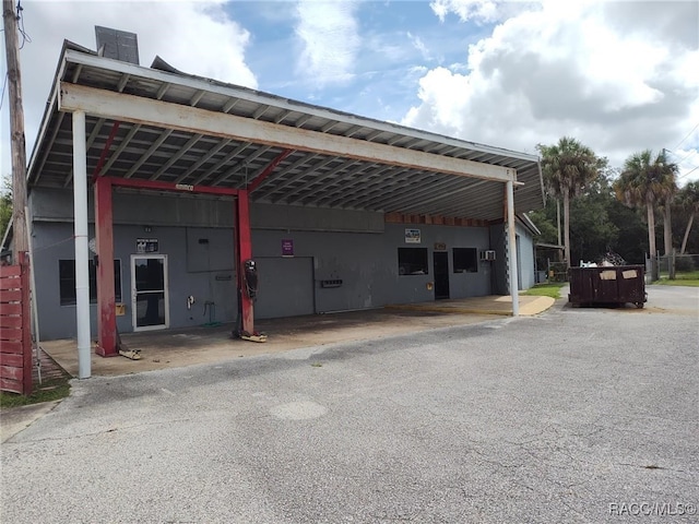 view of parking / parking lot with a carport