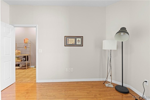 unfurnished room featuring light wood-type flooring