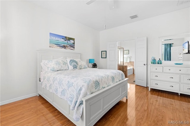 bedroom with light hardwood / wood-style floors and ceiling fan