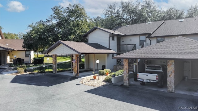 exterior space with a carport