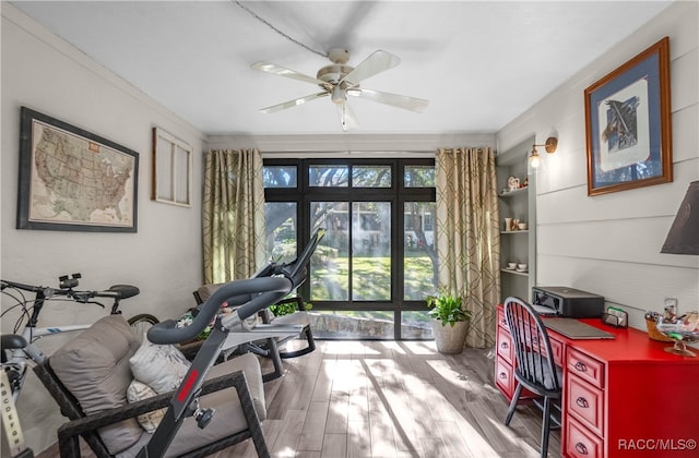 office area with ceiling fan and light wood-type flooring