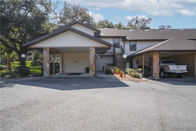 view of front of house featuring a carport