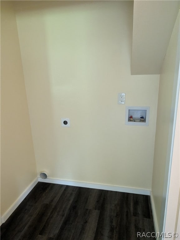 washroom featuring electric dryer hookup, washer hookup, and dark hardwood / wood-style floors